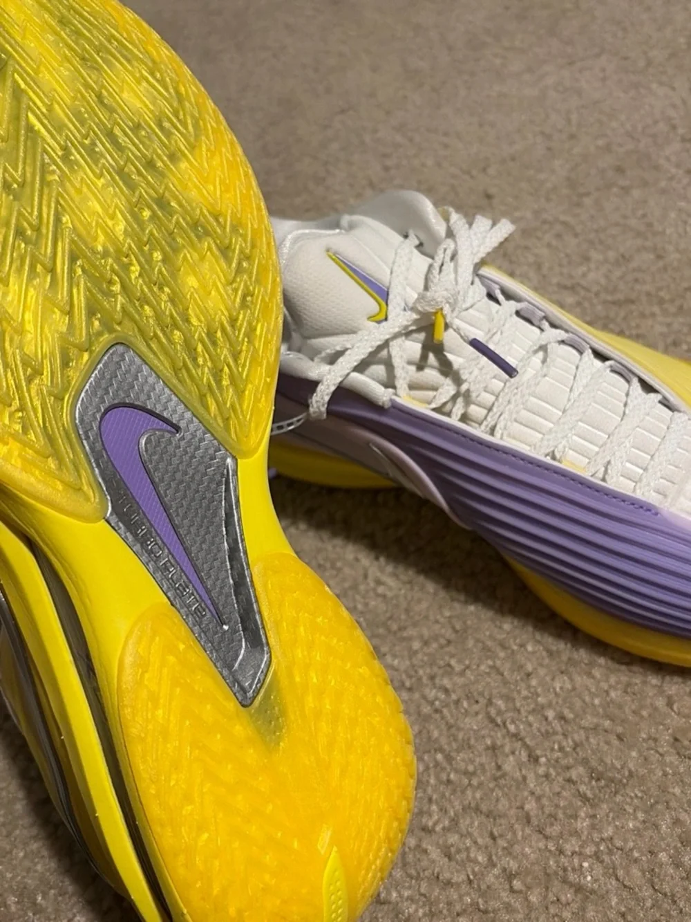 Nike Kids White Sneakers with Yellow and Lavender Accents